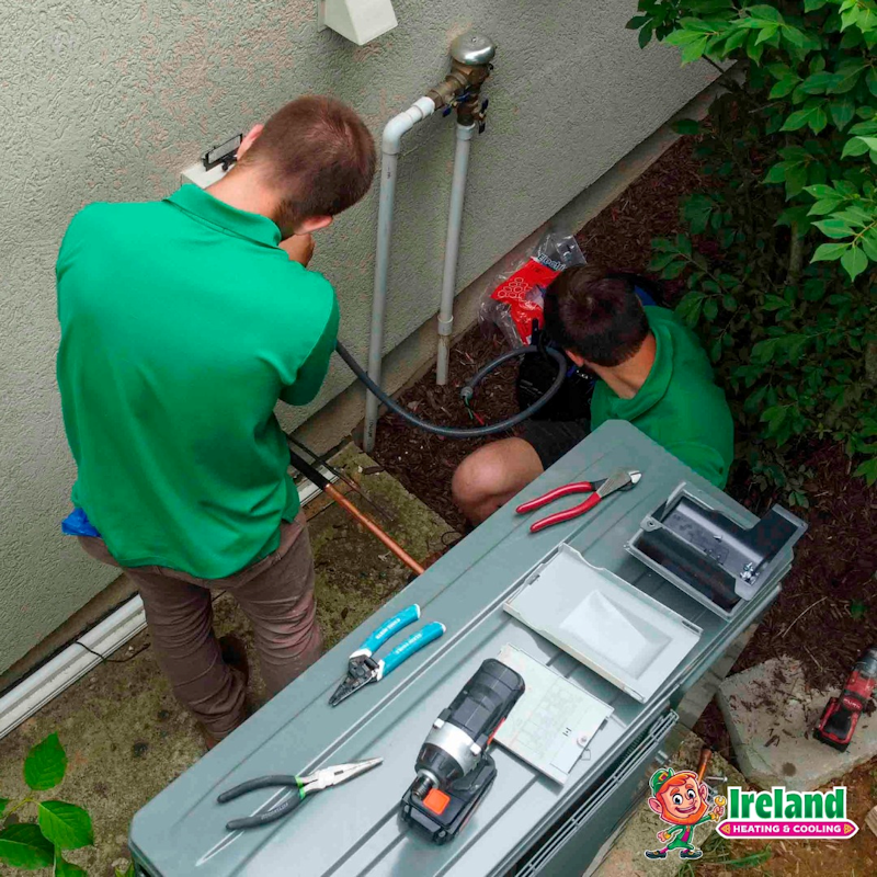 Ireland Heating and Cooling technician inspecting a ductless mini split system
